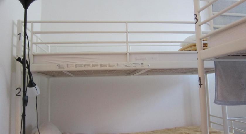 Cama em Dormitório Misto com 4 Camas